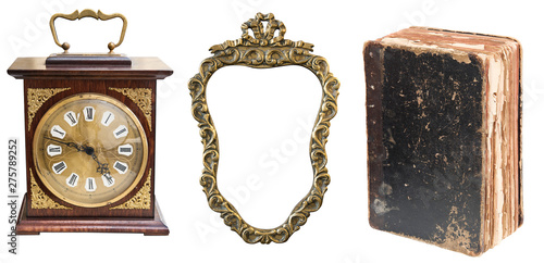 Set of beautiful antique items, Antique clock, golden frame and shabby old book.
