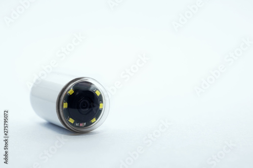 Obraz na płótnie Capsule with camera for capsular endoscopy on white background