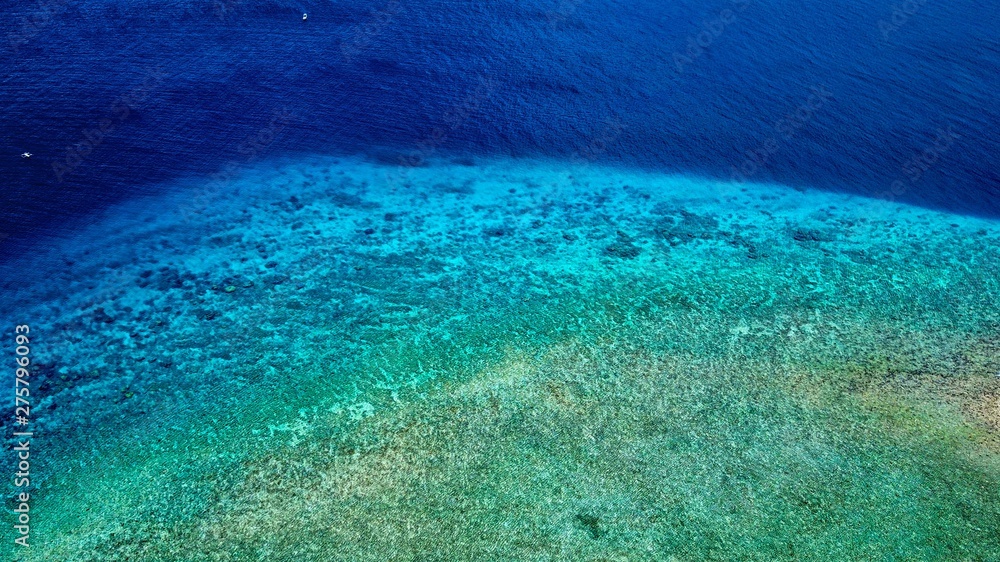 Obraz premium Aerial view of Gili island's reefs and corals near Bali, Indonesia
