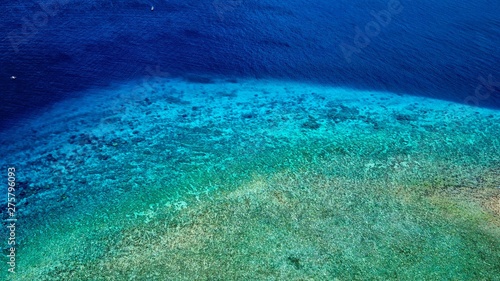 Aerial view of Gili island's reefs and corals near Bali, Indonesia