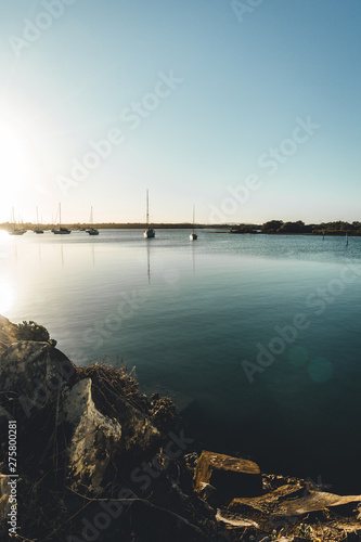 Late afternoon sun on the river at Yamba, Northern New South Wales, Australia photo