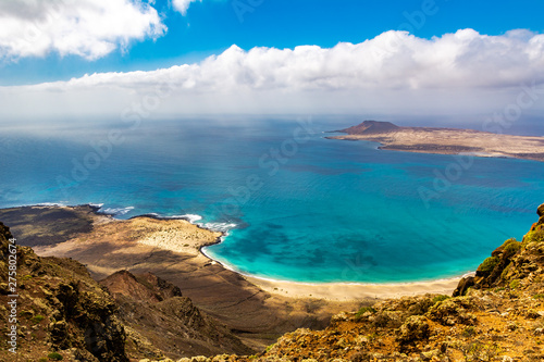 Amazing view of beautiful volcanic island Graciosa - panoramic view near Mirador del rio, Lanzarote. Location: north of Lanzarote, Canary Islands, Spain. Artistic picture. Beauty world.
