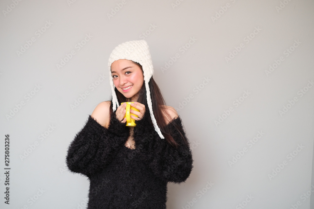 Asian girl wearing winter clothing