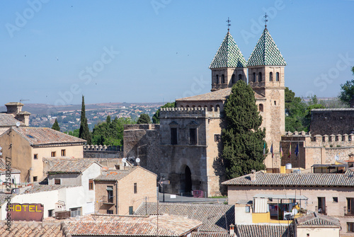 Toledo, Spain - April 30 / 2019 : landscape of toledo old town composed of houses and port bisagra