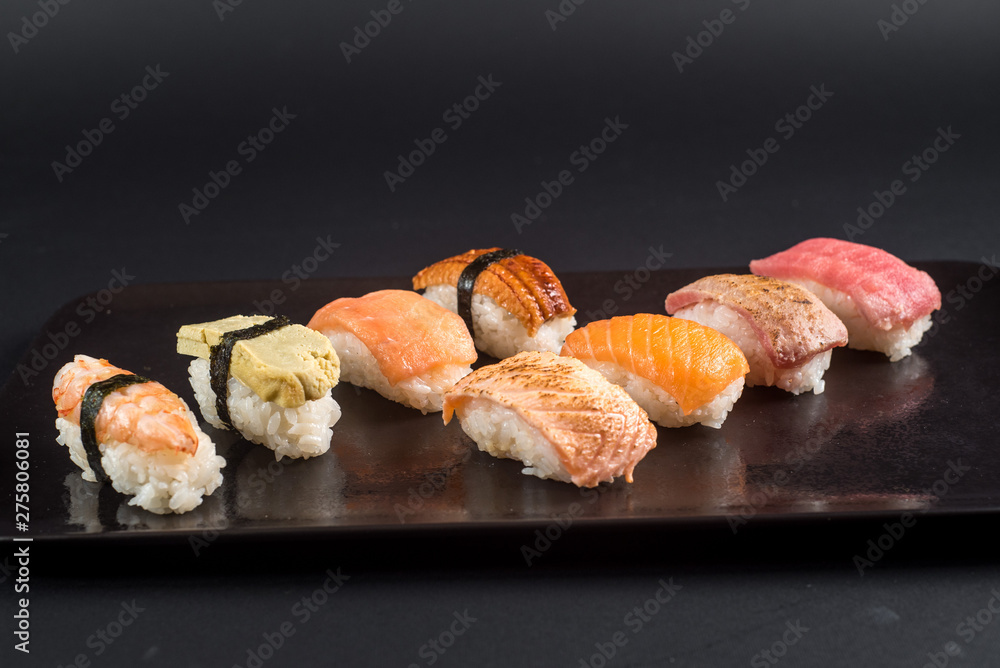 sashimi sushi set on black background sashimi sushi set on black background