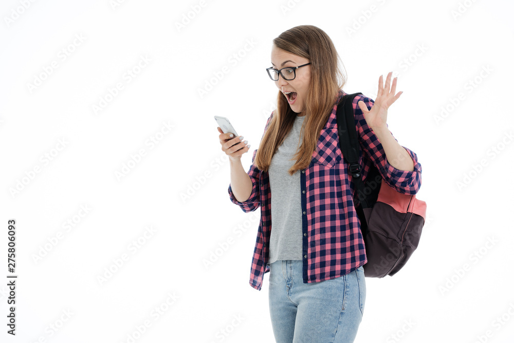 Portrait of a young smilling student girl on a white background. Portrait of a young smilling student girl on a white background.