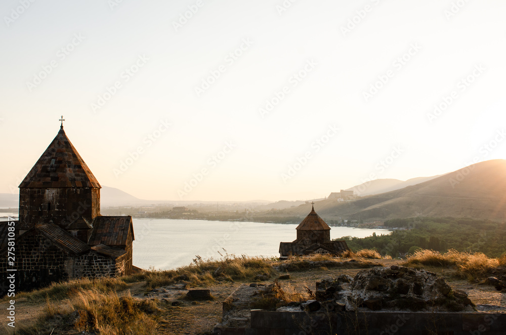 old Sevanavanq monastery in Sevan, Armenia while sunset