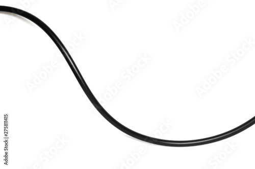 A Black wire cable isolated on a white background abstraction. photo
