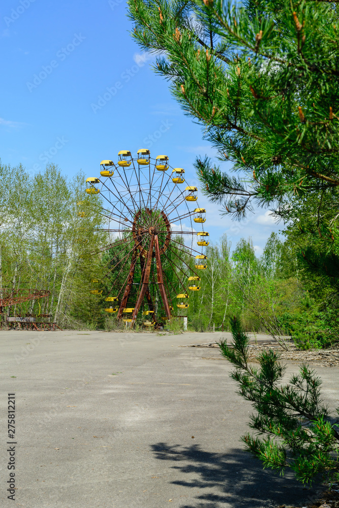 The ferris wheel of Pripyat, Ukraine 2019. Blue sky and white cloud.