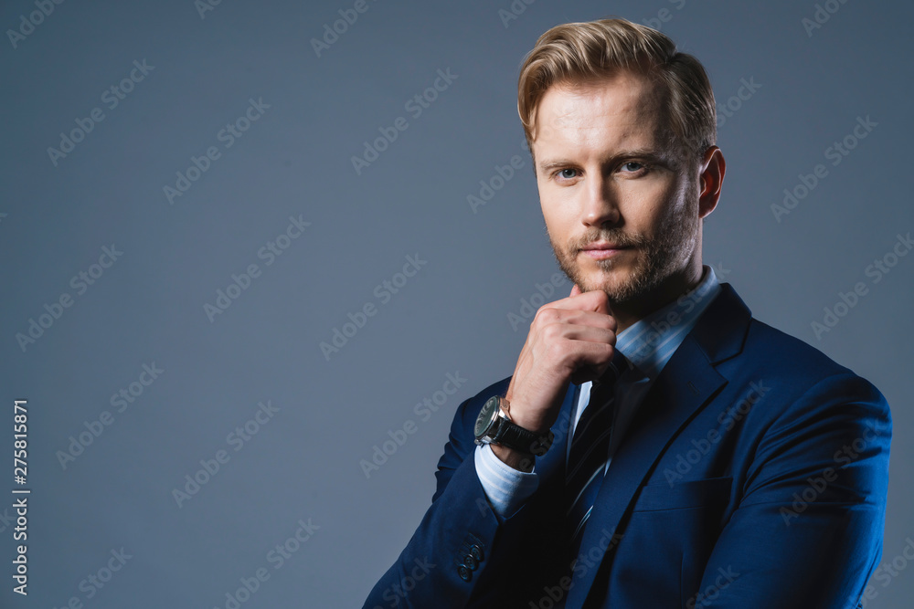 © whyframeshot - elegance caucasian Successful businessman  with beard close up wear formal suit tie grey background