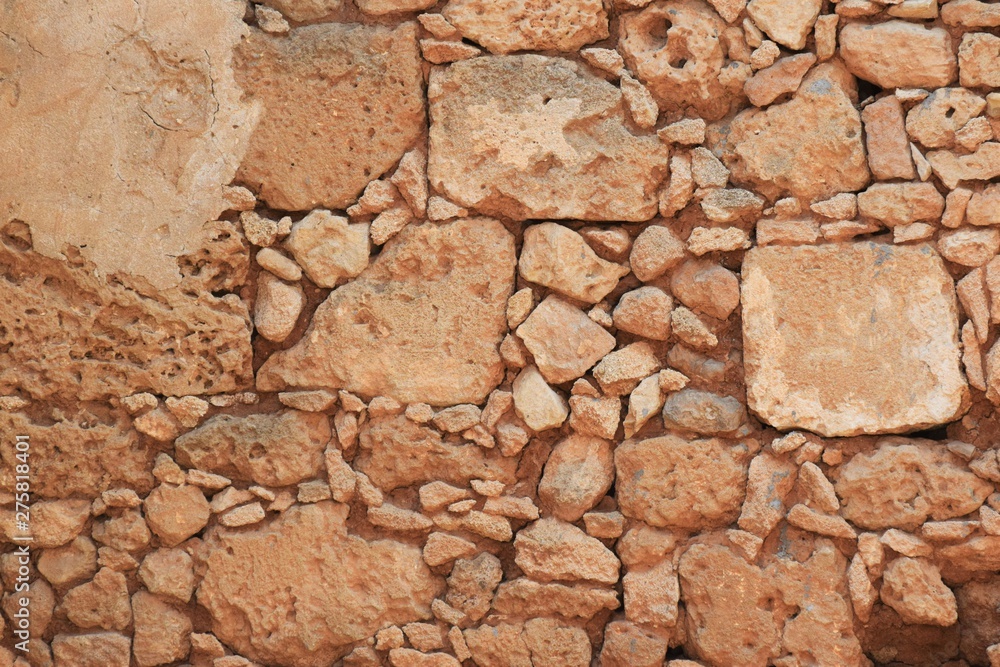 Fototapeta premium Old yellow brick wall background