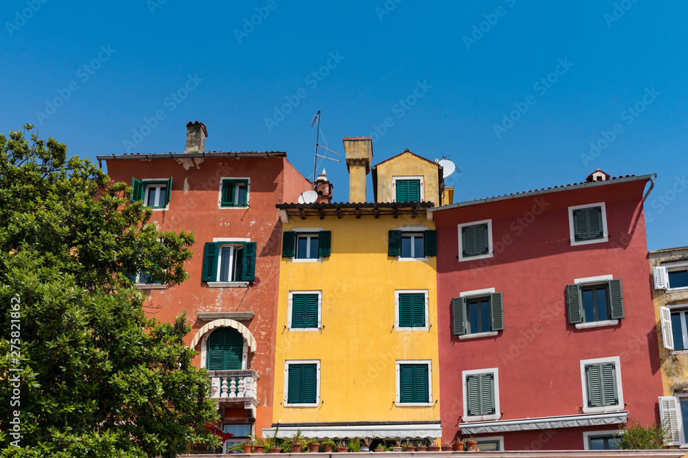 colorful houses with green shutters in Rovinj, Croatia