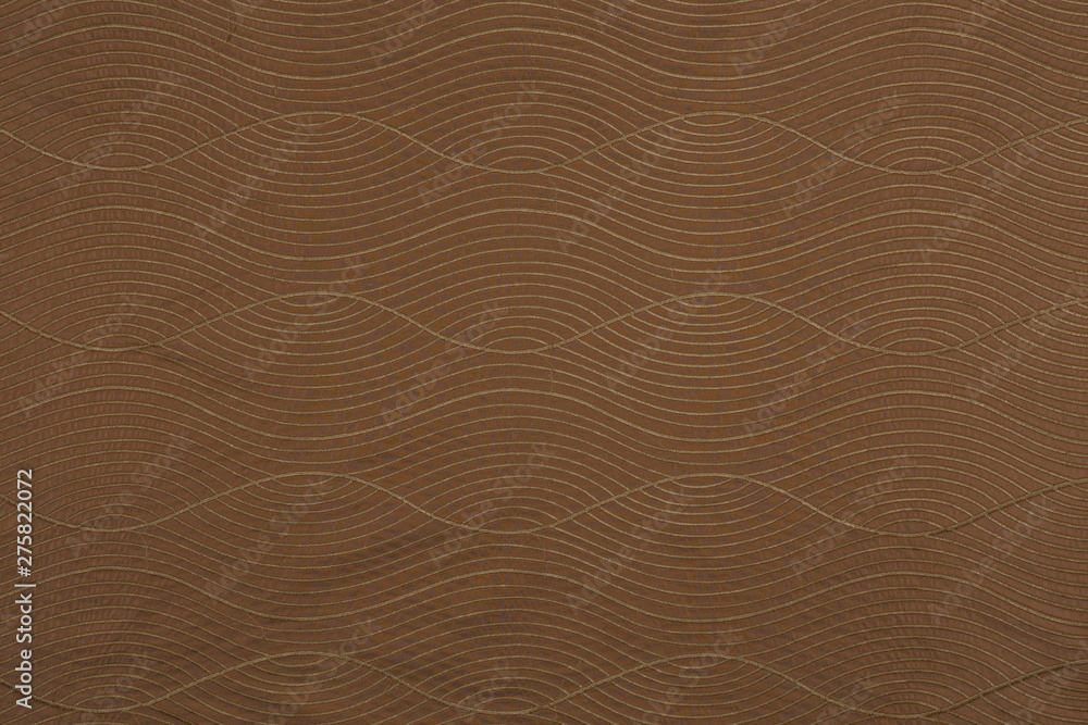 Beautiful brown creative fabric with wavy textile texture background Beautiful brown creative fabric with wavy textile texture background