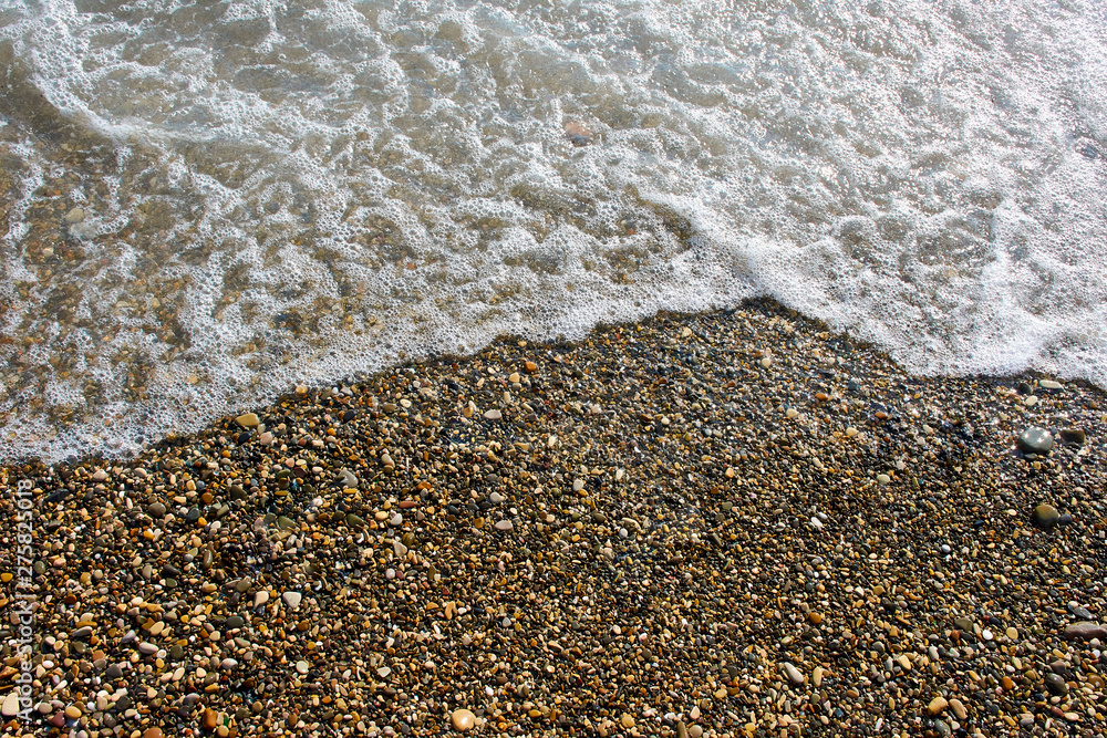 Sea foam and stones Sea foam and stones