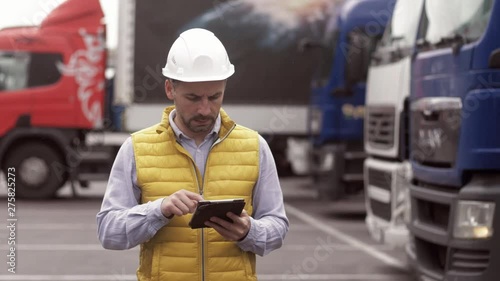 Foreman control loading Containers box to truck for Logistic Import Export Background, Business logistic concept, import and export concept