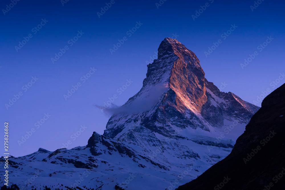 Closeup the famous Matterhorn peak snow mountain landscape in sunset at Gornergrat station in Zermatt, Switzerland
