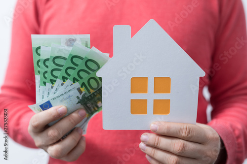 Euro money and house plans