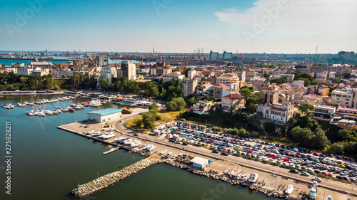 Aerial view of port and old town in Constanta, tourist and industrial town and popular resort in Romania. © Milan