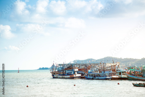 fisherman boat and transportation in seafood industry at seashore © Yanukit