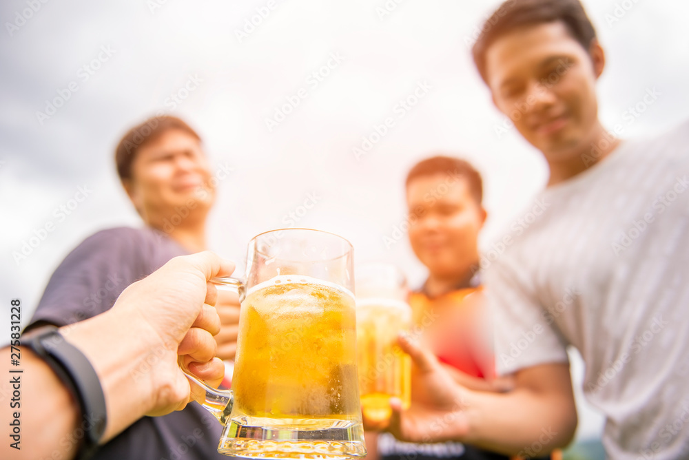 Group of happy friends drinking beer at outdoor, Happy friendship concept Group of happy friends drinking beer at outdoor, Happy friendship concept