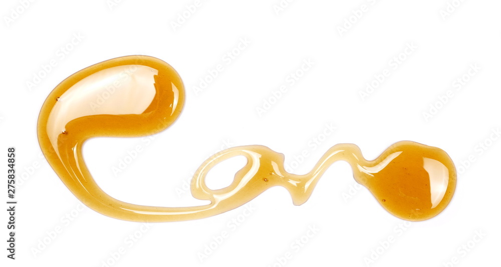 Honey isolated on white background, top view Honey isolated on white background, top view