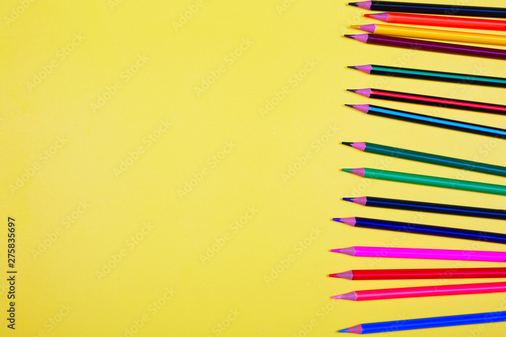 Colorful pencils with copy space on yellow background,education back to school, sale, shopping concept. Colorful pencils with copy space on yellow background,education back to school, sale, shopping concept.