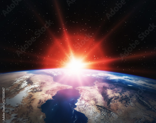 Fototapeta Naklejka Na Ścianę i Meble -  Epic sunrise from space. The elements of this image furnished by NASA.