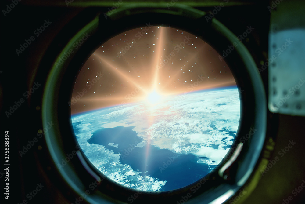 Fototapeta premium Sunrise, view from spaceship. Elements of this image furnished by NASA.