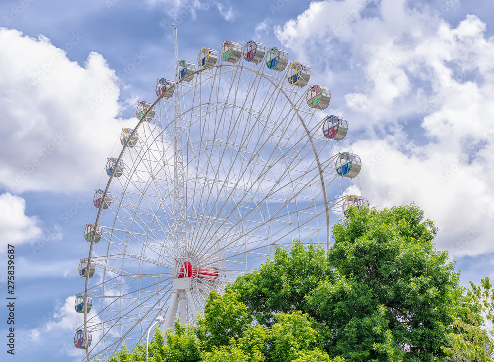 Attraction on a cloudy blue sky
