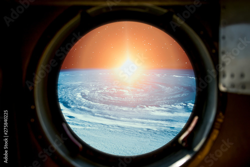 Sunrise  view from spaceship. Elements of this image furnished by NASA.