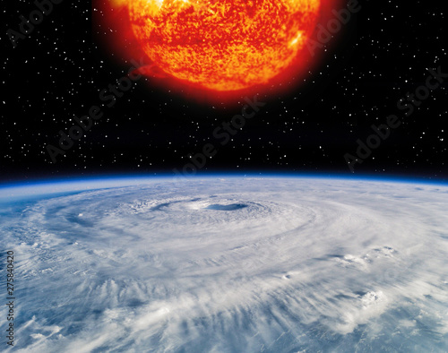 Fototapeta Naklejka Na Ścianę i Meble -  Earth and sun. Distance between them. The elements of this image furnished by NASA.