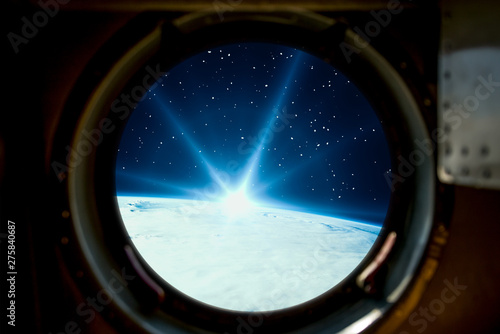 Sunrise, view from spaceship. Elements of this image furnished by NASA. © wowinside