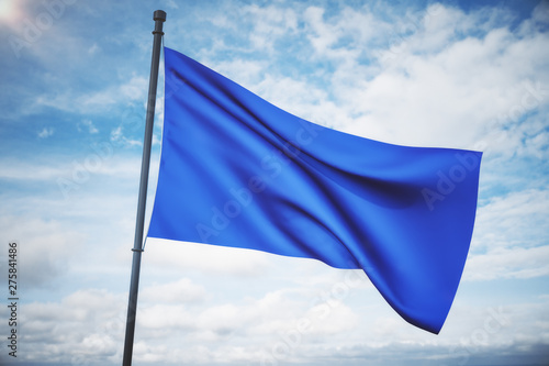 Empty blue flag in sky