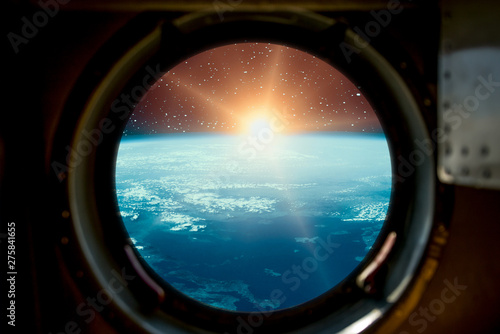 Sunrise  view from spaceship. Elements of this image furnished by NASA.