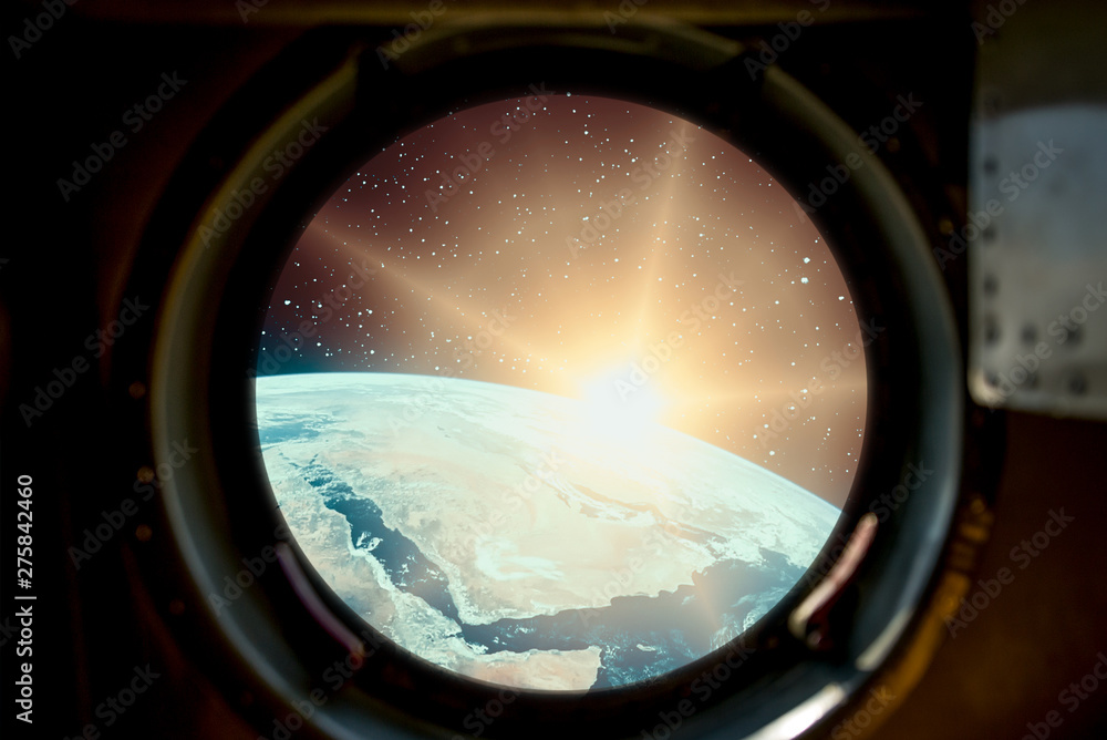 Fototapeta premium Sunrise, view from spaceship. Elements of this image furnished by NASA.