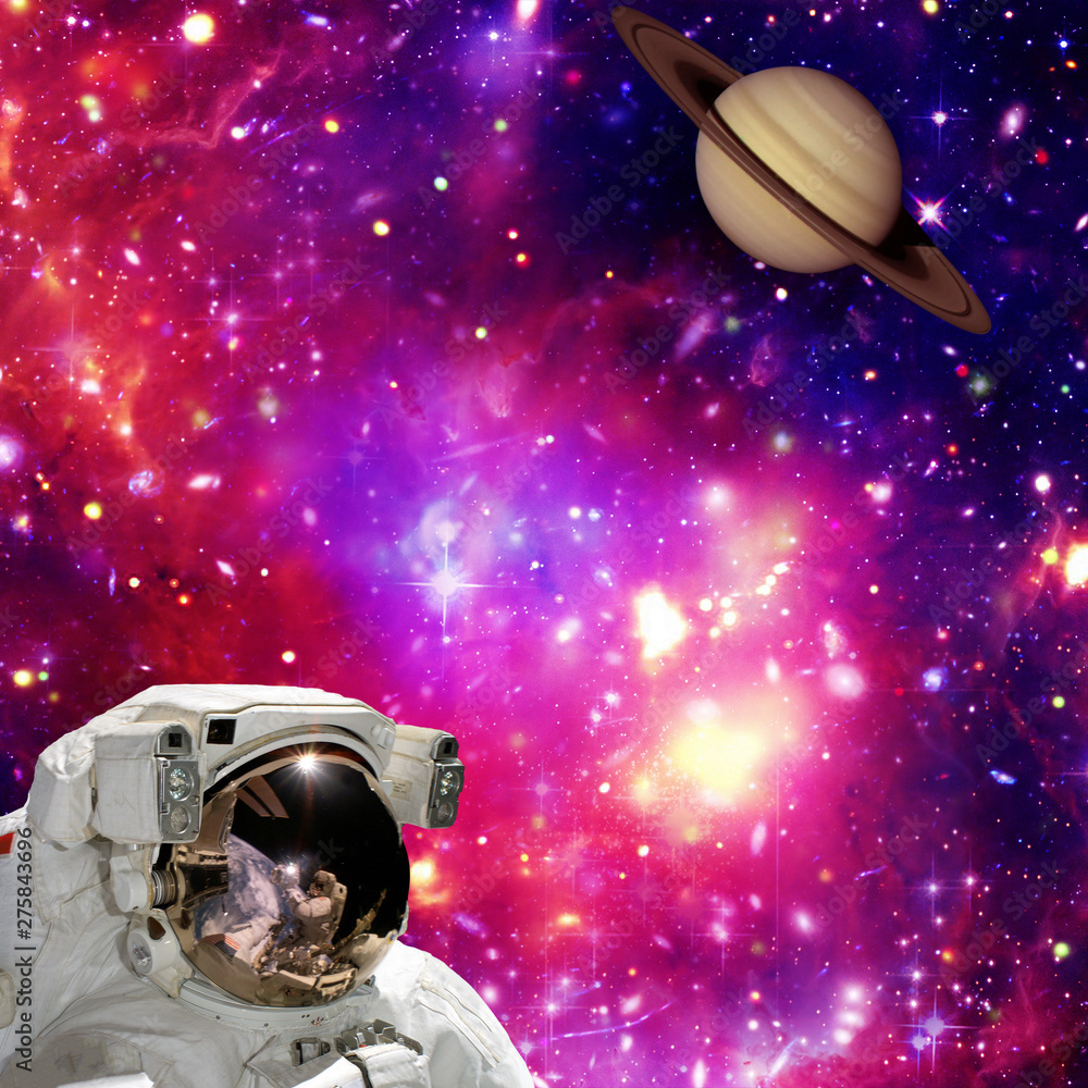 Fototapeta premium Astronaut looking at the planet against space. The elements of this image furnished by NASA.