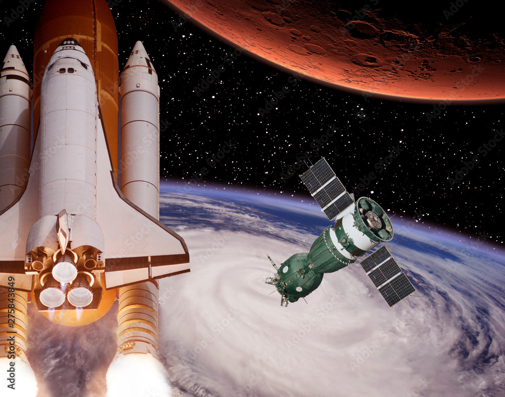 Rocket flies from earth to Mars. Spaceship in the distance. The elements of this image furnished by NASA. Rocket flies from earth to Mars. Spaceship in the distance. The elements of this image furnished by NASA.