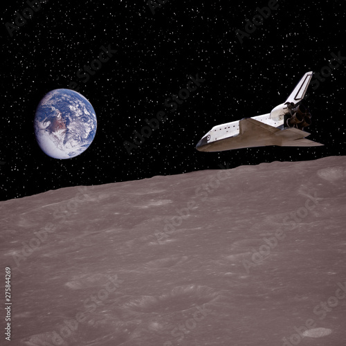 Space mission to the alien planet.  Shuttle flies above the planet landscape. The elements of this image furnished by NASA.