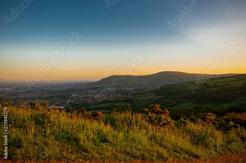 Colorful sunset at Cave Hill Country Park Belfast, Northern Ireland. Aerial view on City and hills  © Maciej