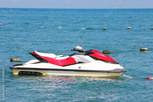 sea motorcycle jetski scooter on a background of blue sea