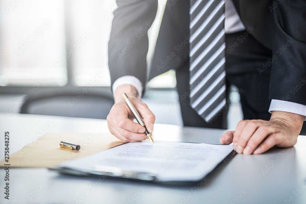 Business man signing contract, making a deal. Business man signing contract, making a deal.