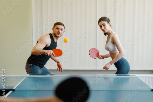 Friends playing sport game, group ping pong