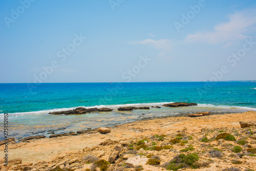  pristine seascapes with crystal clear blue water and yellow rocks in Ayia Napa  Cyprus