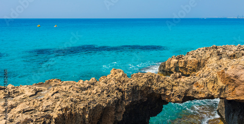  pristine seascapes with crystal clear blue water and yellow rocks in Ayia Napa, Cyprus © serhii