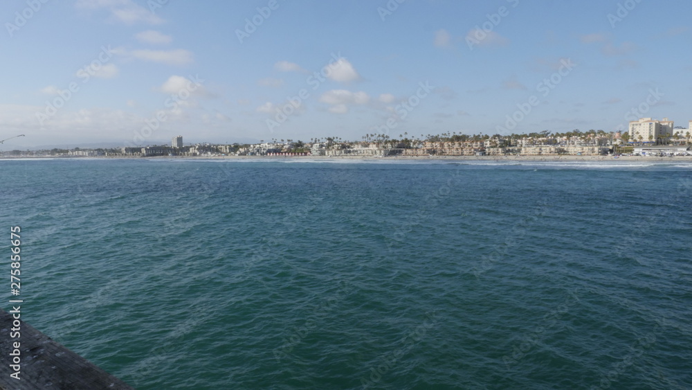 Oceanside Pier California with beach coastline and fishing rods shot in high resolution 