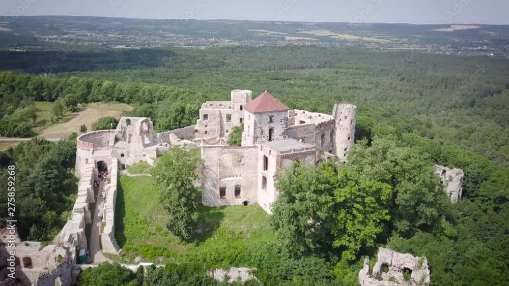 Beautiful historic castle ruins on a green hill. Ruins of Tenczyn Castle in Rudno, Poland. Beautiful historic castle ruins on a green hill. Ruins of Tenczyn Castle in Rudno, Poland.