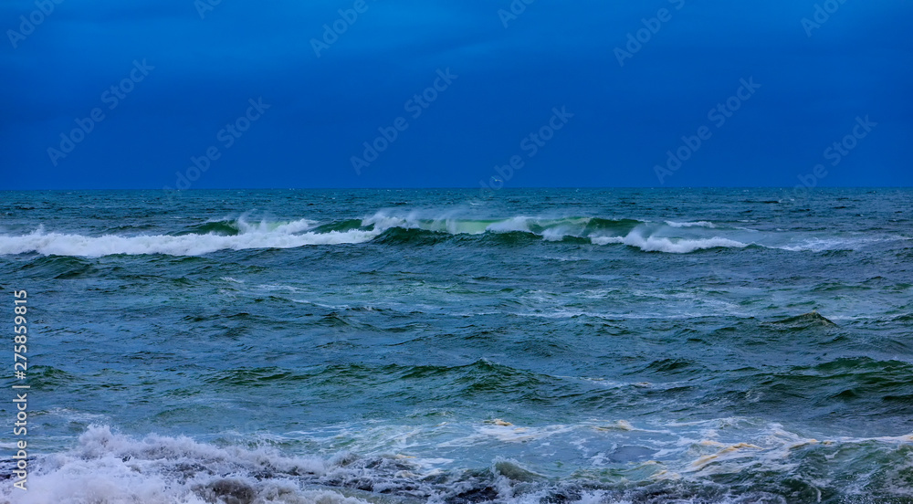 The blue water background with waves.