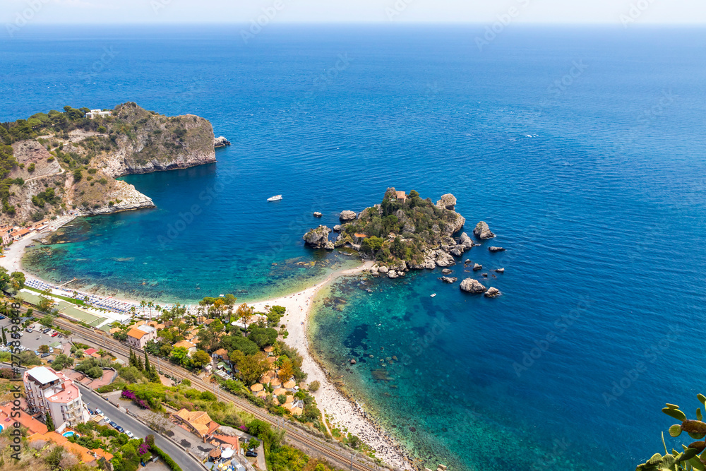 Aerial view of Isola Bella island and beach in Taormina, Sicily, Italy. Giardini-Naxos bay, Ionian sea coast. Isola Bella (Sicilian: Isula Bedda) also known as The Pearl of the Ionian Sea