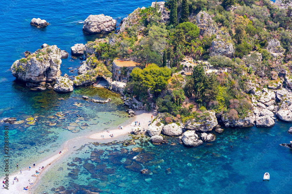 Aerial view of Isola Bella island and beach in Taormina, Sicily, Italy. Giardini-Naxos bay, Ionian sea coast. Isola Bella (Sicilian: Isula Bedda) also known as The Pearl of the Ionian Sea