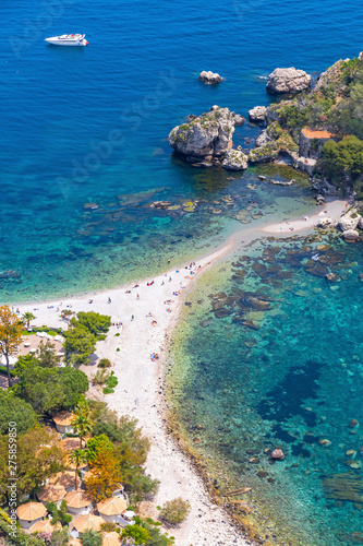 Aerial view of Isola Bella island and beach in Taormina, Sicily, Italy. Giardini-Naxos bay, Ionian sea coast. Isola Bella (Sicilian: Isula Bedda) also known as The Pearl of the Ionian Sea